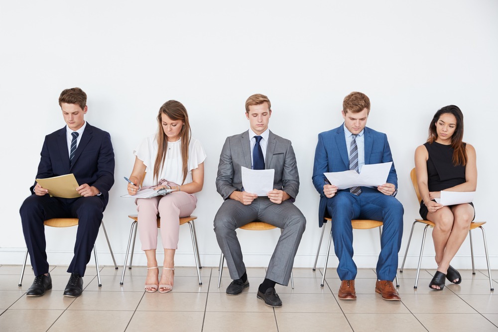 people waiting in chairs