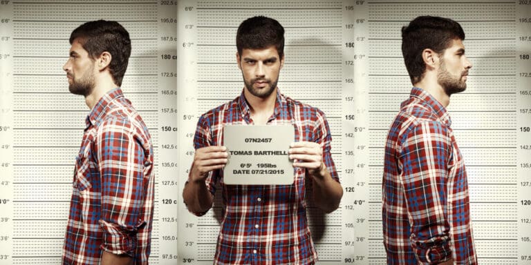 man getting stl mugshots taken