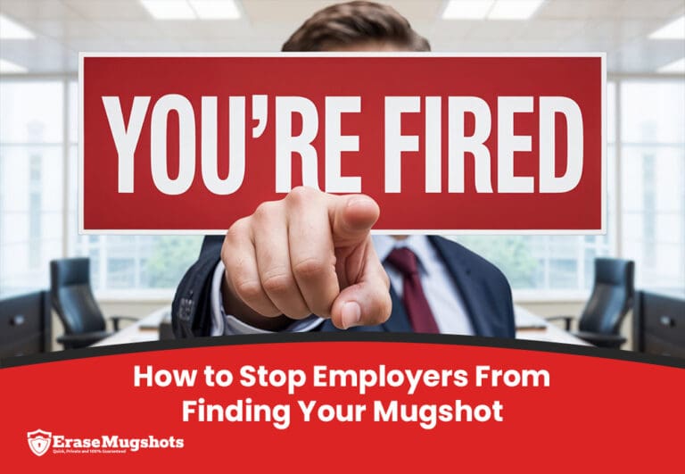 A person in a suit points directly at the camera, holding a large red sign that says "YOU'RE FIRED." Below, text reads: "How to Stop Employers From Finding Your Mugshot" with the Erase Mugshots logo. Protect your reputation from mugshot searches.